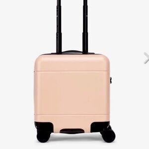 Calpak Hue Mini Carry-On luggage